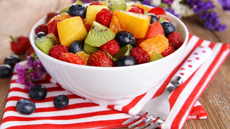 salad, fruits, raspberries, strawberries, blueberries, grapes, kiwi, mango, orange (horizontal)