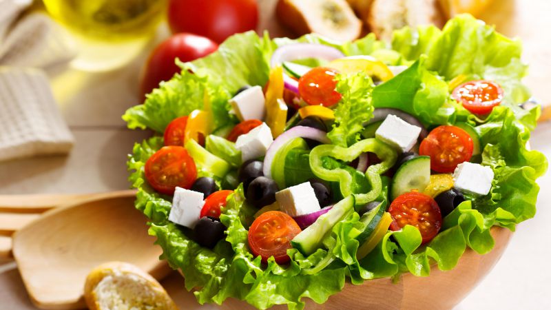 Greek salad, tomato, olives, peppers, onions, cheese, feto (horizontal)