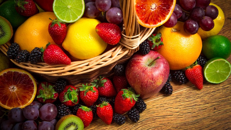 basket fruit, lemon, lime, apple, grapes, strawberries, blackberries, kiwi, grapefruit,  (horizontal)