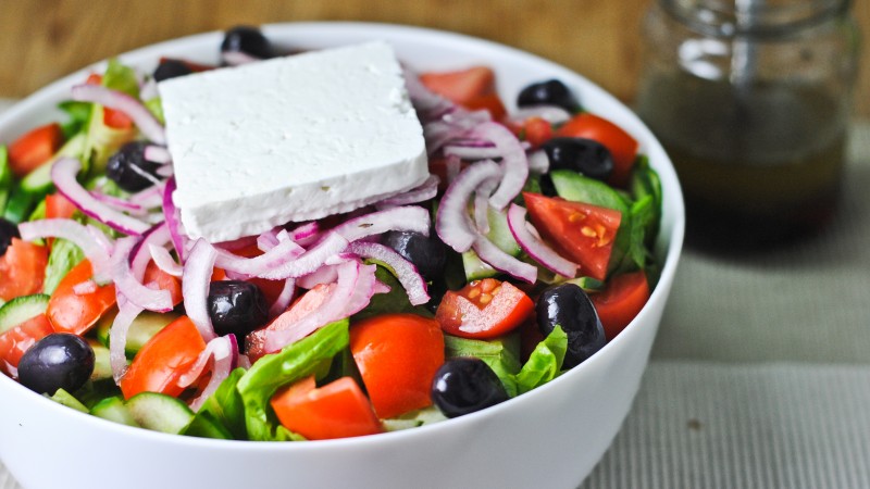 Greek, cooking, recipe, lettuce, tomatoes, cucumbers, olives, feta, onion (horizontal)