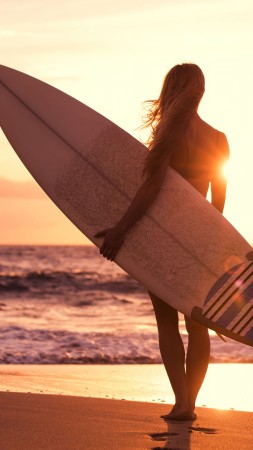 Surfing, girl, beach, sun, sea (vertical)