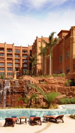 Kampala Serena, Uganda, Hotel, resort, pool, water, sunbed, waterfall, orange, travel, vacation, booking (vertical)