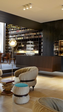 B2 Boutique Hotel and Spa, Zurich, Switzerland, Best Hotels of 2015, library, room, chair, booking (vertical)