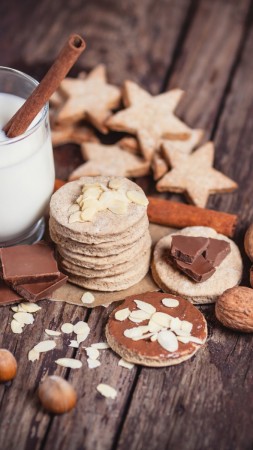 milk, drinks, spices, cinnamon, nuts, walnuts, hazelnuts, almonds, chocolate, baking, figurines, cookie (vertical)