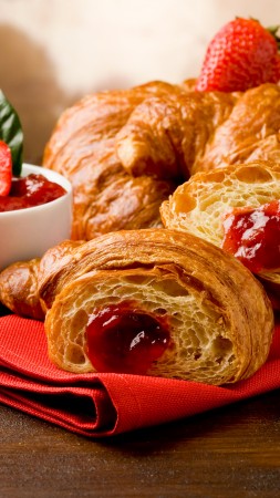 French croissants, fruit, strawberry jam (vertical)