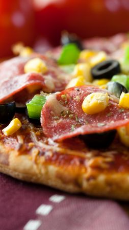 Pizza, salami, corn, olives (vertical)