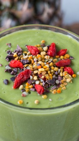 smoothies, lime, avocado, pineapple, goji berries, nuts (vertical)