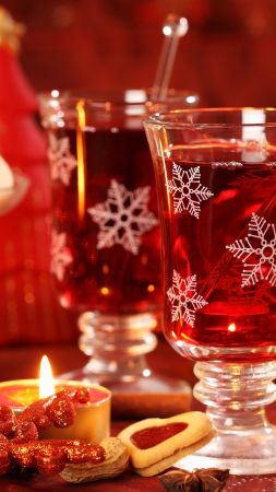 Mulled wine, candle, biscuits, cinnamon, decorations, peanuts, Christmas (vertical)