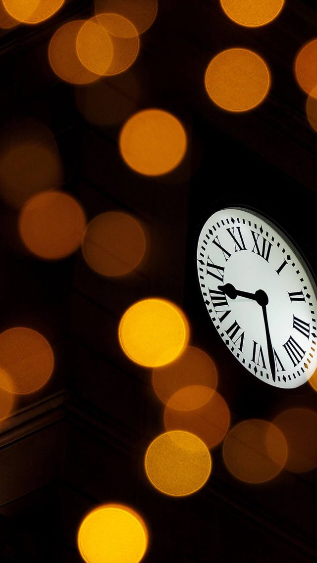 clock, Puerta del Sol, Madrid, Spain, 4K (vertical)